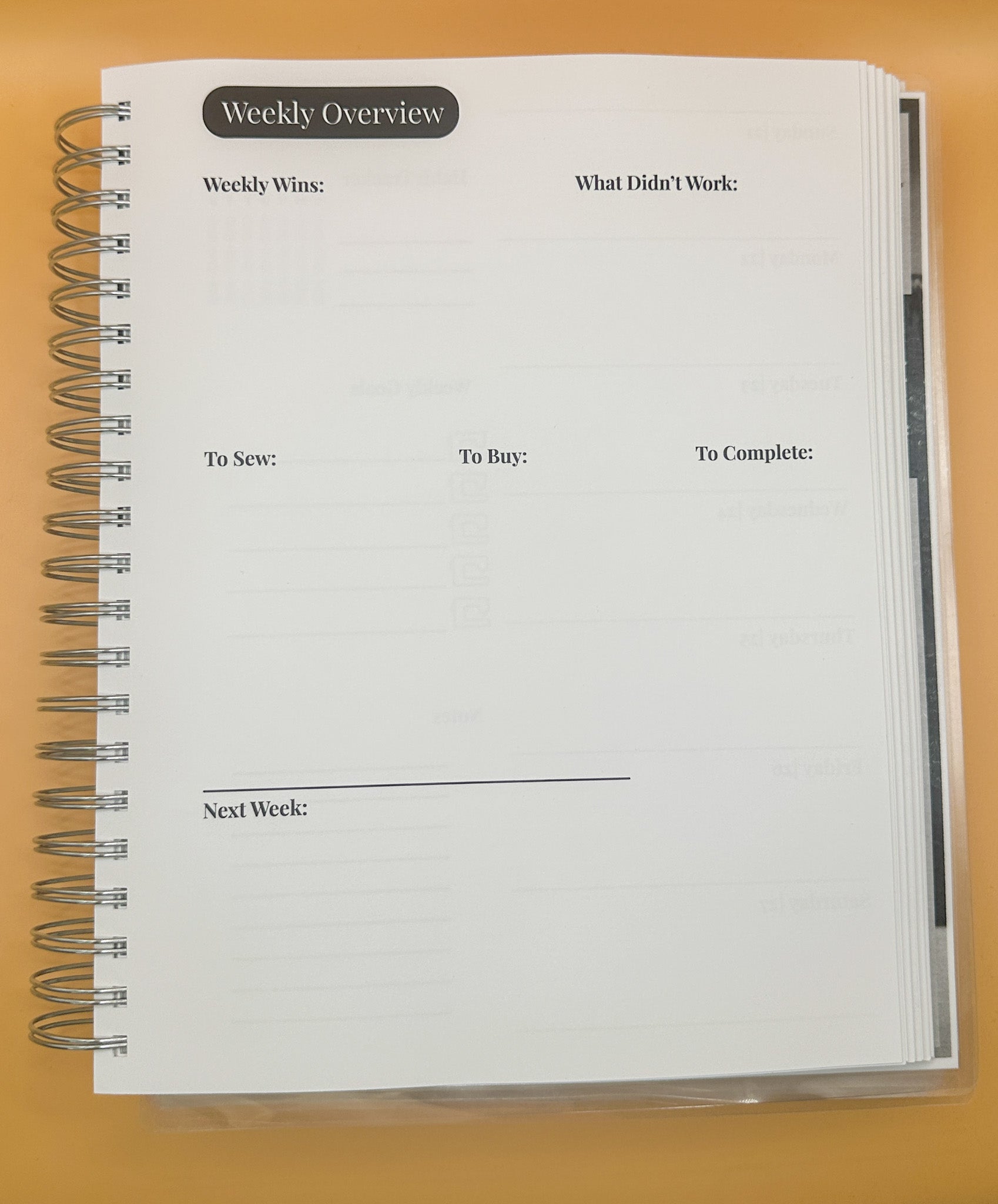 Weekly sewing planner layout with sections for 'Weekly Wins', 'What Didn't Work', 'To Sew', 'To Buy', for organizing projects.